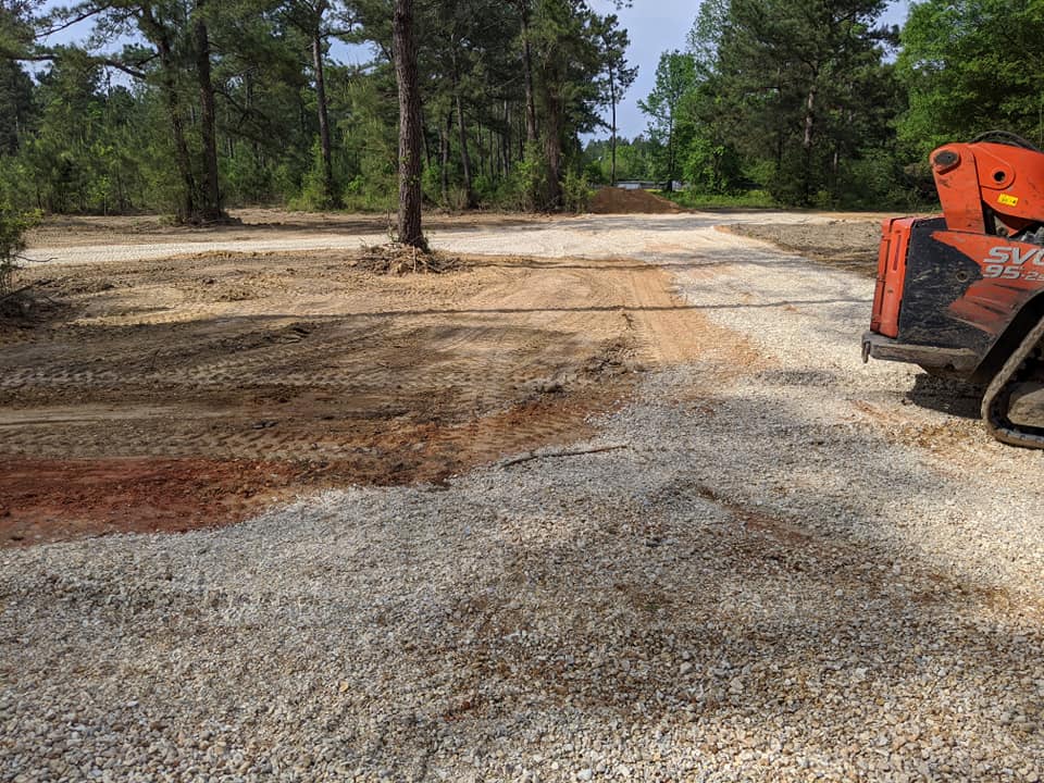 gravel being laid down and graded in covington la